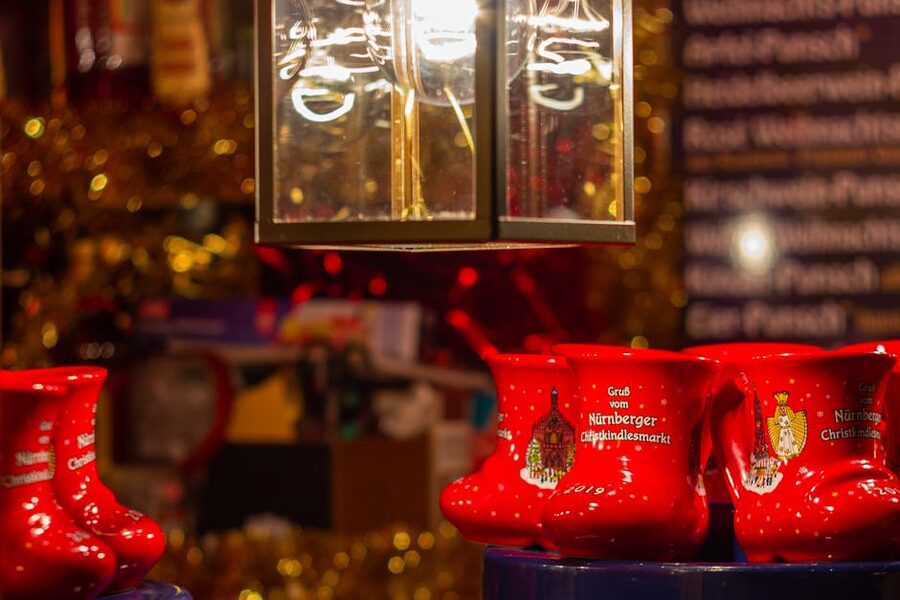 Decorated red Christmas market mugs stacked on a Nuremberg Christmas market stall