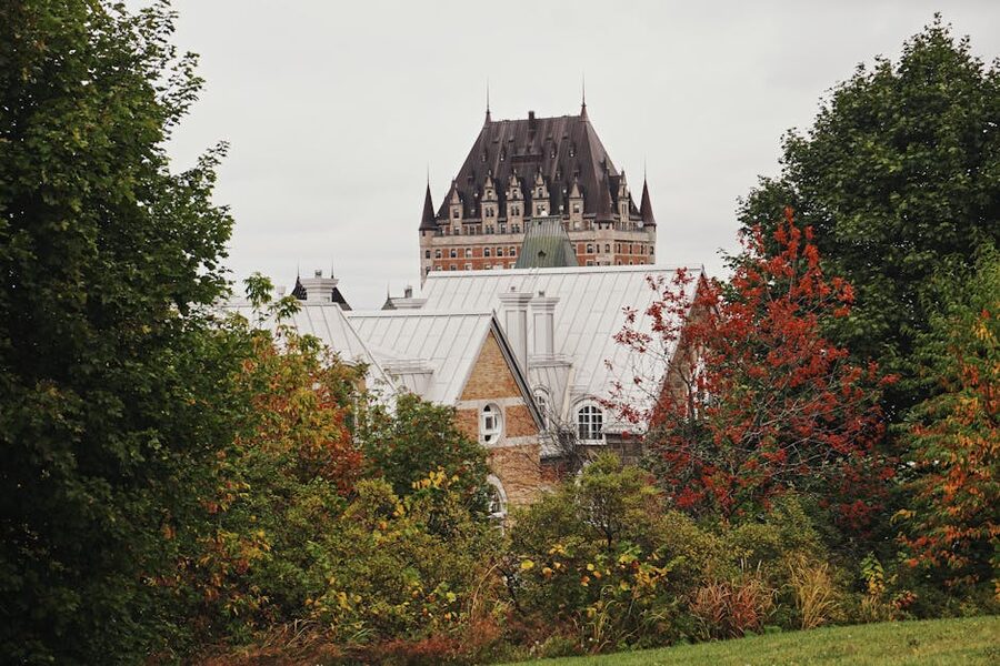 Chateau Frontenac framed by autumn trees in Quebec City