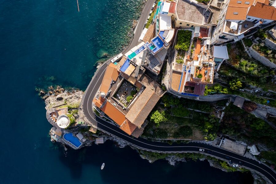 Aerial view of houses and roads along the Amalfi Coast in Italy