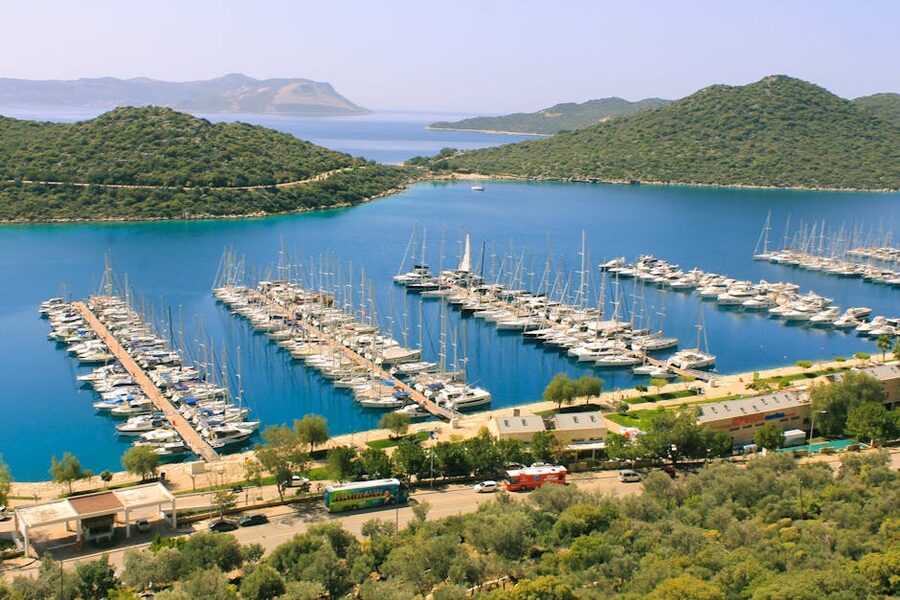 Setur Kas Marina with yachts and lush greenery from above