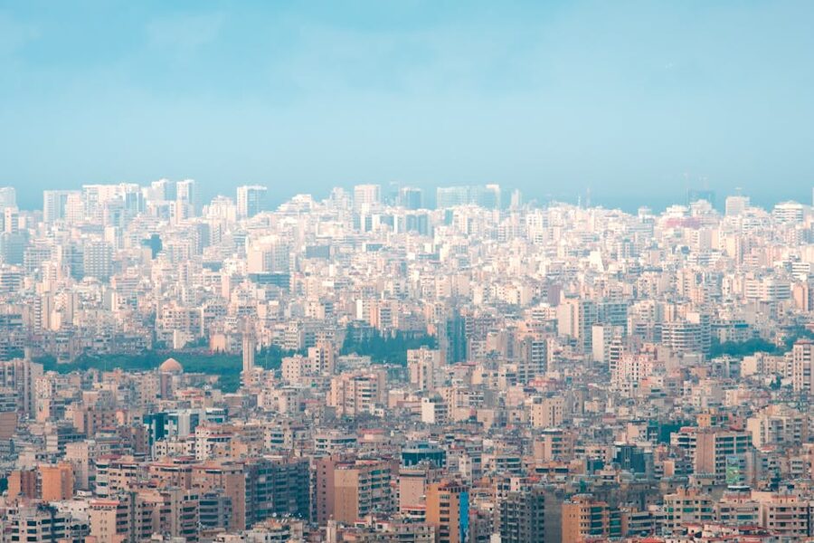 Aerial view of Beirut's dense skyline showing modern skyscrapers and Mediterranean coast