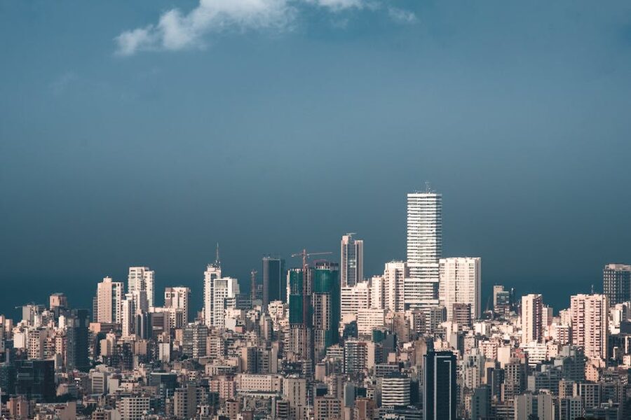 Beirut skyline under blue sky with modern skyscrapers and the Mediterranean coast