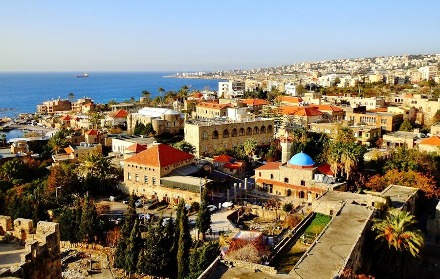 Aerial view of Byblos showing the historic harbor, castle, and Mediterranean coastline