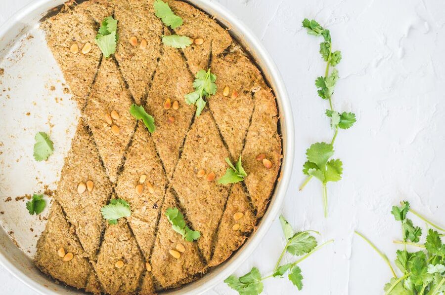 Traditional Lebanese kibbeh garnished with herbs