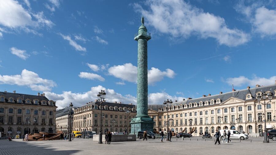 The Vendome Column rising in the centre of Place Vendome, Paris