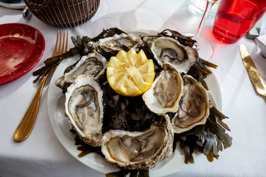Plate of fresh oysters with lemon