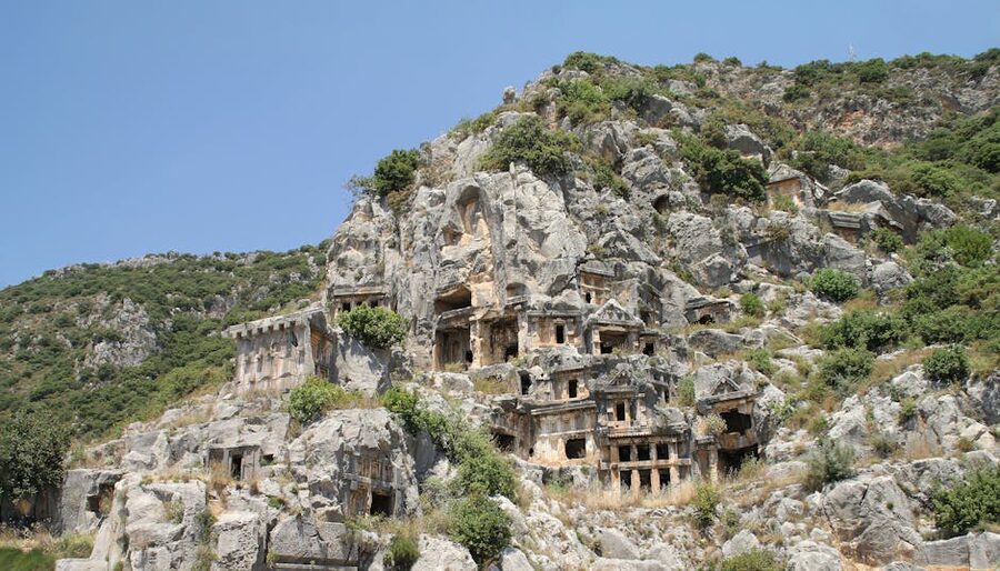 Lycian tombs in Myra, Turkey carved into a mountain cliff