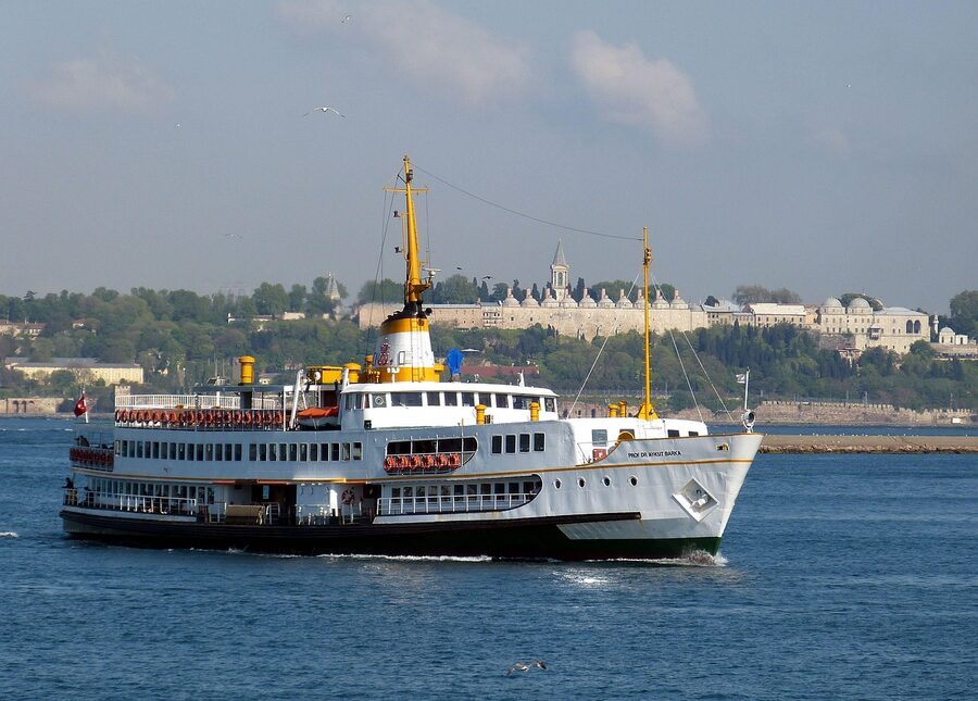 View of Bosphorus shoreline from a passing ship with mosque skyline