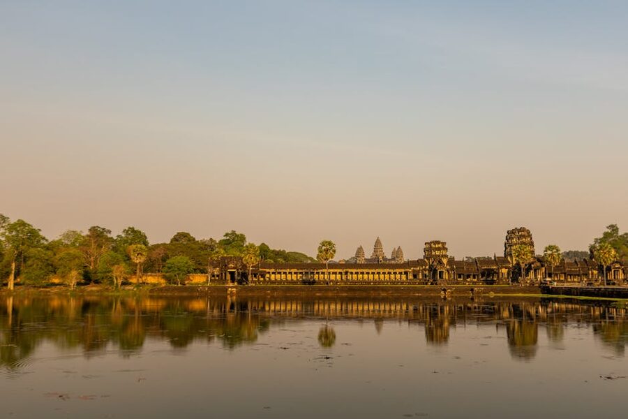 Angkor Wat temple reflecting in the lotus pond at sunrise