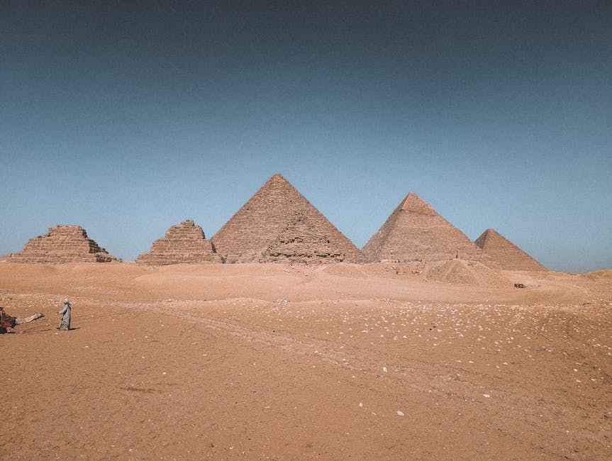 The Great Pyramids of Giza in Egypt under blue sky