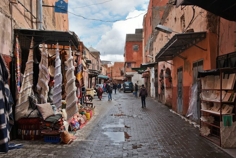 Street scene in the Marrakech medina with traditional fabrics
