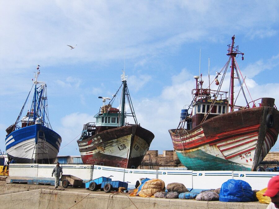 The fishing port at Essaouira with traditional blue boats