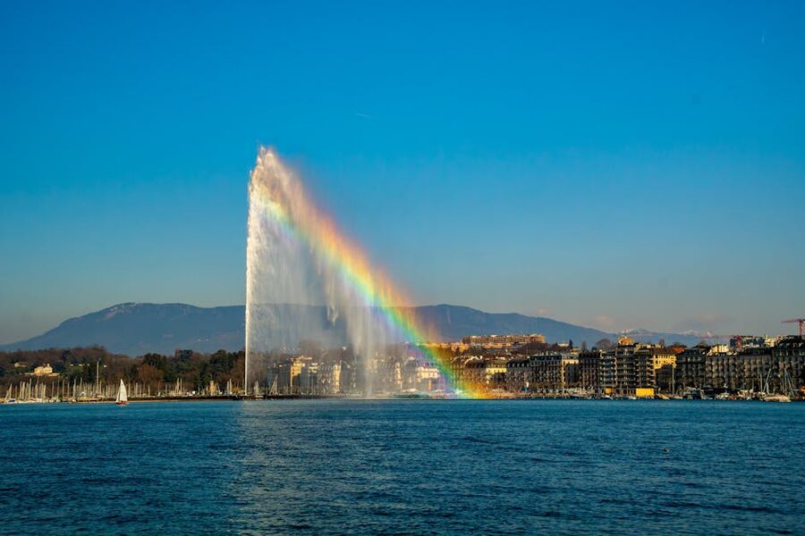 Jet d'Eau fountain with a rainbow over Lake Geneva in Switzerland