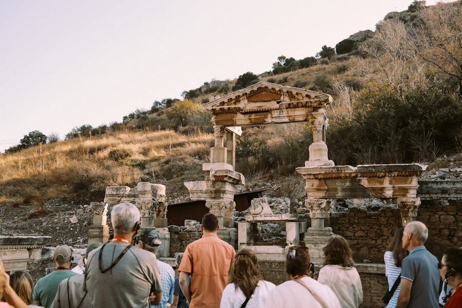 Tourists exploring Roman ruins at Ephesus